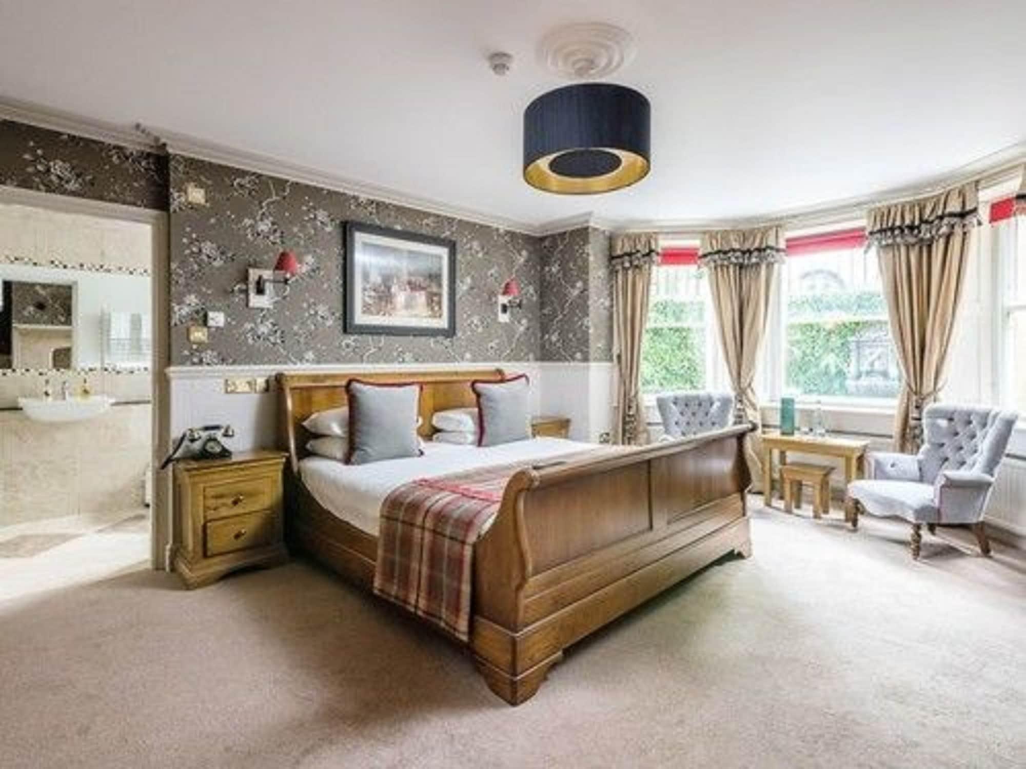 The Ayrlington Guesthouse Bath Exterior foto A bedroom at the hotel
